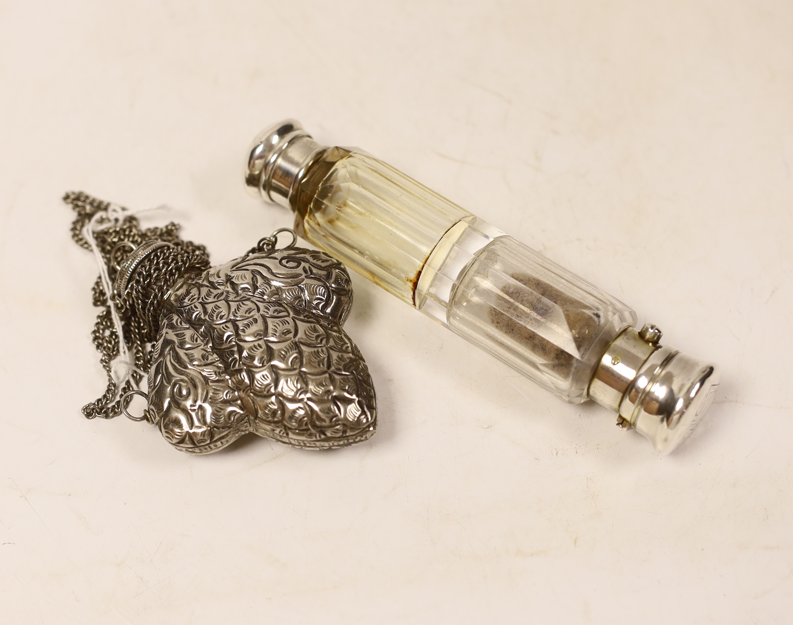 A white metal mounted double ended scent bottle, 14.5cm and one other white metal scent flask.